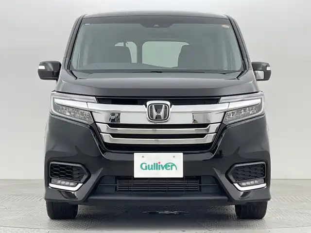 ホンダ ステップワゴン スパーダ ホンダセンシング 新潟県 2021(令3)年 3.3万km プレミアムスパークルブラックパール 4WD/ホンダセンシング/　・衝突被害軽減システム/　・アダプティブクルーズコントロール/　・路外逸脱抑制機能/　・誤発進抑制機能/わくわくゲート/純正9インチナビ/　（フルセグTV/BT/CD/DVD/USB/AM/FM//　AppleCarPlay）/バックカメラ/両側パワースライドドア/LEDオートライト/純正16インチアルミホイール/アイドリングストップ/USBポート/スマートキー/ETC2.0