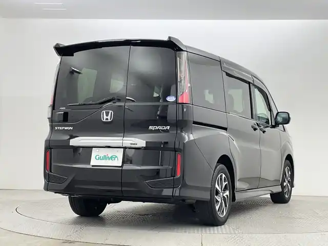 ホンダ ステップワゴン スパーダ ホンダセンシング 新潟県 2021(令3)年 3.3万km プレミアムスパークルブラックパール 4WD/ホンダセンシング/　・衝突被害軽減システム/　・アダプティブクルーズコントロール/　・路外逸脱抑制機能/　・誤発進抑制機能/わくわくゲート/純正9インチナビ/　（フルセグTV/BT/CD/DVD/USB/AM/FM//　AppleCarPlay）/バックカメラ/両側パワースライドドア/LEDオートライト/純正16インチアルミホイール/アイドリングストップ/USBポート/スマートキー/ETC2.0