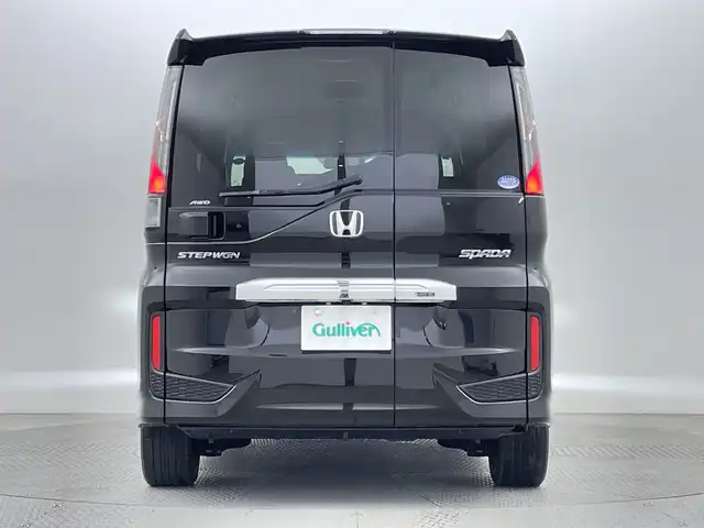 ホンダ ステップワゴン スパーダ ホンダセンシング 新潟県 2021(令3)年 3.3万km プレミアムスパークルブラックパール 4WD/ホンダセンシング/　・衝突被害軽減システム/　・アダプティブクルーズコントロール/　・路外逸脱抑制機能/　・誤発進抑制機能/わくわくゲート/純正9インチナビ/　（フルセグTV/BT/CD/DVD/USB/AM/FM//　AppleCarPlay）/バックカメラ/両側パワースライドドア/LEDオートライト/純正16インチアルミホイール/アイドリングストップ/USBポート/スマートキー/ETC2.0