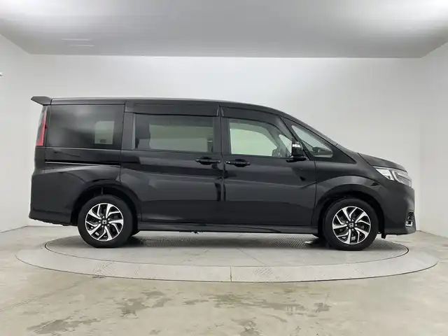 ホンダ ステップワゴン スパーダ ホンダセンシング 新潟県 2021(令3)年 3.3万km プレミアムスパークルブラックパール 4WD/ホンダセンシング/　・衝突被害軽減システム/　・アダプティブクルーズコントロール/　・路外逸脱抑制機能/　・誤発進抑制機能/わくわくゲート/純正9インチナビ/　（フルセグTV/BT/CD/DVD/USB/AM/FM//　AppleCarPlay）/バックカメラ/両側パワースライドドア/LEDオートライト/純正16インチアルミホイール/アイドリングストップ/USBポート/スマートキー/ETC2.0