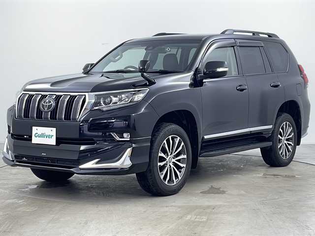 トヨタ ランドクルーザー プラド TX Lパッケージ 道央・札幌 2020(令2)年 2.4万km ブラック ・4WD/・社外SDナビ&フルセグ&CD&DVD&BT/・トヨタセーフティセンス/・プリクラッシュセーフティ/・レーンディパーチャーアラート/・レーダークルーズコントロール/・オートマチックハイビーム/・クリアランスソナー/・純正フリップダウンモニター/・フロントモデリスタエアロ/・電動格納サイドシート/・バックカメラ/・トランスフォーススイッチ/・ラウンジ証明調光スイッチ/・セカンドスタートモードスイッチ/・社外ドライブレコーダー/・ビルトインETC/・レザーシート/・シートヒーター/・パワーシート/・エアーシート/・オートワイパー/・革巻きステアリング/・へットランプクリーナー/・オートライト/・LEDヘッドライト/・LEDフォグ/・スペアキー/・スマートキー/・プッシュスタート/・横滑り防止