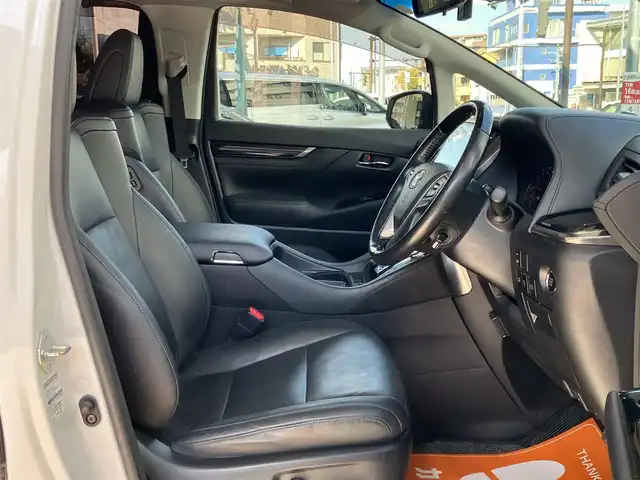 トヨタ ヴェルファイア Z Gエディション 神奈川県 2018(平30)年 7.7万km ホワイトパールクリスタルシャイン ワンオーナー/新車保証書/取扱説明書/レザーシート/サンルーフ/モデリスタエアロ/3眼LEDヘッドライト/トヨタセーフティセンス/・レーンレーシングアシスト/・クリアランスソナー/・プリクラッシュセーフティ/・ロードサインアシスト/・レーダークルーズコントロール（全車速追従機能付き）/・オートマチックハイビーム/純正ナビ・フルセグTV/CD・DVDビデオ・Bluetooth/HDMI・USB・SD/バックカメラ/デジタルインナーミラー/純正フリップダウンモニター/ビルトインETC2.0/前席パワーシート/前席快適温熱シート/助手席・後席電動オットマン/後席エグゼクティブパワーシート/両側パワースライドドア/パワーバックドア/ステアリングスイッチ/サンシェード/純正18インチアルミホイール/ドアバイザー/フロアーマット