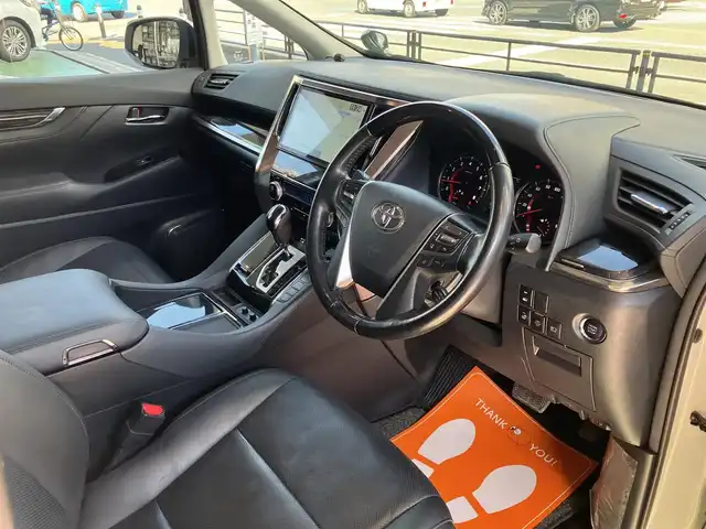 トヨタ ヴェルファイア Z Gエディション 神奈川県 2018(平30)年 7.7万km ホワイトパールクリスタルシャイン ワンオーナー/新車保証書/取扱説明書/レザーシート/サンルーフ/モデリスタエアロ/3眼LEDヘッドライト/トヨタセーフティセンス/・レーンレーシングアシスト/・クリアランスソナー/・プリクラッシュセーフティ/・ロードサインアシスト/・レーダークルーズコントロール（全車速追従機能付き）/・オートマチックハイビーム/純正ナビ・フルセグTV/CD・DVDビデオ・Bluetooth/HDMI・USB・SD/バックカメラ/デジタルインナーミラー/純正フリップダウンモニター/ビルトインETC2.0/前席パワーシート/前席快適温熱シート/助手席・後席電動オットマン/後席エグゼクティブパワーシート/両側パワースライドドア/パワーバックドア/ステアリングスイッチ/サンシェード/純正18インチアルミホイール/ドアバイザー/フロアーマット