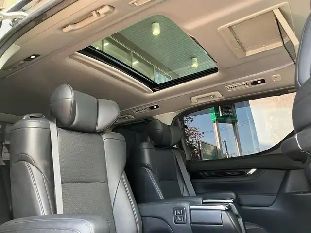 トヨタ ヴェルファイア Z Gエディション 神奈川県 2018(平30)年 7.7万km ホワイトパールクリスタルシャイン ワンオーナー/新車保証書/取扱説明書/レザーシート/サンルーフ/モデリスタエアロ/3眼LEDヘッドライト/トヨタセーフティセンス/・レーンレーシングアシスト/・クリアランスソナー/・プリクラッシュセーフティ/・ロードサインアシスト/・レーダークルーズコントロール（全車速追従機能付き）/・オートマチックハイビーム/純正ナビ・フルセグTV/CD・DVDビデオ・Bluetooth/HDMI・USB・SD/バックカメラ/デジタルインナーミラー/純正フリップダウンモニター/ビルトインETC2.0/前席パワーシート/前席快適温熱シート/助手席・後席電動オットマン/後席エグゼクティブパワーシート/両側パワースライドドア/パワーバックドア/ステアリングスイッチ/サンシェード/純正18インチアルミホイール/ドアバイザー/フロアーマット