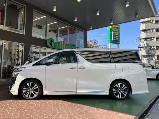 トヨタ ヴェルファイア Z Gエディション 神奈川県 2018(平30)年 7.7万km ホワイトパールクリスタルシャイン ワンオーナー/新車保証書/取扱説明書/レザーシート/サンルーフ/モデリスタエアロ/3眼LEDヘッドライト/トヨタセーフティセンス/・レーンレーシングアシスト/・クリアランスソナー/・プリクラッシュセーフティ/・ロードサインアシスト/・レーダークルーズコントロール（全車速追従機能付き）/・オートマチックハイビーム/純正ナビ・フルセグTV/CD・DVDビデオ・Bluetooth/HDMI・USB・SD/バックカメラ/デジタルインナーミラー/純正フリップダウンモニター/ビルトインETC2.0/前席パワーシート/前席快適温熱シート/助手席・後席電動オットマン/後席エグゼクティブパワーシート/両側パワースライドドア/パワーバックドア/ステアリングスイッチ/サンシェード/純正18インチアルミホイール/ドアバイザー/フロアーマット