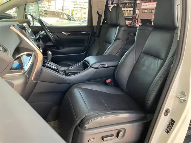 トヨタ ヴェルファイア Z Gエディション 神奈川県 2018(平30)年 7.7万km ホワイトパールクリスタルシャイン ワンオーナー/新車保証書/取扱説明書/レザーシート/サンルーフ/モデリスタエアロ/3眼LEDヘッドライト/トヨタセーフティセンス/・レーンレーシングアシスト/・クリアランスソナー/・プリクラッシュセーフティ/・ロードサインアシスト/・レーダークルーズコントロール（全車速追従機能付き）/・オートマチックハイビーム/純正ナビ・フルセグTV/CD・DVDビデオ・Bluetooth/HDMI・USB・SD/バックカメラ/デジタルインナーミラー/純正フリップダウンモニター/ビルトインETC2.0/前席パワーシート/前席快適温熱シート/助手席・後席電動オットマン/後席エグゼクティブパワーシート/両側パワースライドドア/パワーバックドア/ステアリングスイッチ/サンシェード/純正18インチアルミホイール/ドアバイザー/フロアーマット