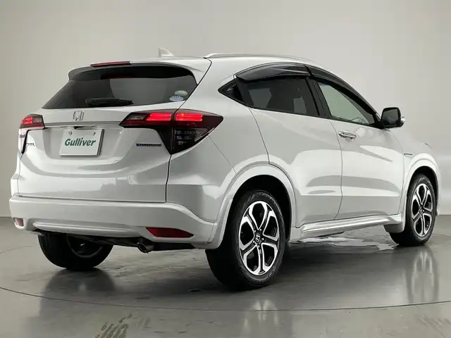 ホンダ ヴェゼル ハイブリッド Z ホンダセンシング 愛知県 2019(令1)年 7.1万km プラチナホワイトパール 純正ナビ　禁煙　シートヒーター　バックカメラ　フルセグ　ＤＶＤ　前後ドラレコ　ＥＴＣ　カープレイ対応　黒ハーフレザー　ホンダセンシング　衝突軽減　レーンキープ　パドルシフト　ＬＥＤオートライト　フォグ 純正17型アルミホイール　カーテンエアバッグ　プラズマクラスター　電子パーキング　防眩ミラー　プッシュスタート　スマートキー
