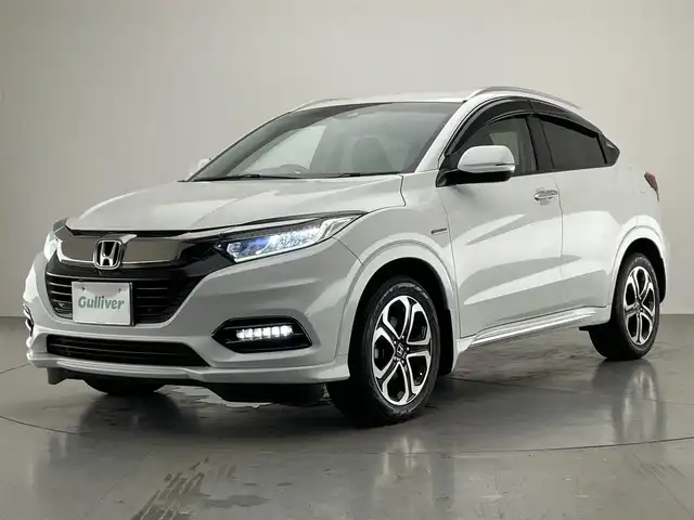 ホンダ ヴェゼル ハイブリッド Z ホンダセンシング 愛知県 2019(令1)年 7.1万km プラチナホワイトパール 純正ナビ　禁煙　シートヒーター　バックカメラ　フルセグ　ＤＶＤ　前後ドラレコ　ＥＴＣ　カープレイ対応　黒ハーフレザー　ホンダセンシング　衝突軽減　レーンキープ　パドルシフト　ＬＥＤオートライト　フォグ 純正17型アルミホイール　カーテンエアバッグ　プラズマクラスター　電子パーキング　防眩ミラー　プッシュスタート　スマートキー