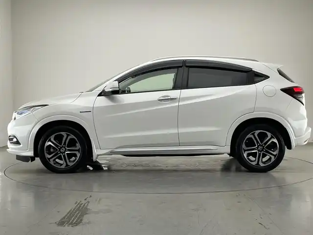 ホンダ ヴェゼル ハイブリッド Z ホンダセンシング 愛知県 2019(令1)年 7.1万km プラチナホワイトパール 純正ナビ　禁煙　シートヒーター　バックカメラ　フルセグ　ＤＶＤ　前後ドラレコ　ＥＴＣ　カープレイ対応　黒ハーフレザー　ホンダセンシング　衝突軽減　レーンキープ　パドルシフト　ＬＥＤオートライト　フォグ 純正17型アルミホイール　カーテンエアバッグ　プラズマクラスター　電子パーキング　防眩ミラー　プッシュスタート　スマートキー