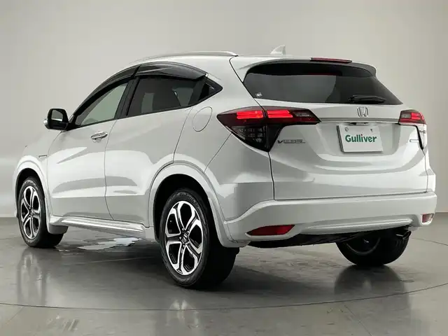 ホンダ ヴェゼル ハイブリッド Z ホンダセンシング 愛知県 2019(令1)年 7.1万km プラチナホワイトパール 純正ナビ　禁煙　シートヒーター　バックカメラ　フルセグ　ＤＶＤ　前後ドラレコ　ＥＴＣ　カープレイ対応　黒ハーフレザー　ホンダセンシング　衝突軽減　レーンキープ　パドルシフト　ＬＥＤオートライト　フォグ 純正17型アルミホイール　カーテンエアバッグ　プラズマクラスター　電子パーキング　防眩ミラー　プッシュスタート　スマートキー