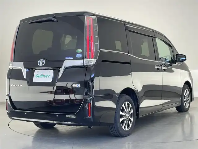 トヨタ エスクァイア ハイブリッド Gi 愛知県 2020(令2)年 2.4万km ブラック 純正９型ナビ　純正後席モニター　禁煙車　バックカメラ　ＥＴＣ　ハーフレザー　シートヒーター　クルコン　　前後ドラレコ　セーフティセンス　衝突軽減　コーナーセンサー　ＬＥＤライト　ＵＳＢ　両側パワスラ