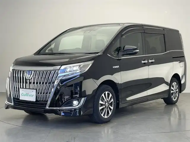 トヨタ エスクァイア ハイブリッド Gi 愛知県 2020(令2)年 2.4万km ブラック 純正９型ナビ　純正後席モニター　禁煙車　バックカメラ　ＥＴＣ　ハーフレザー　シートヒーター　クルコン　　前後ドラレコ　セーフティセンス　衝突軽減　コーナーセンサー　ＬＥＤライト　ＵＳＢ　両側パワスラ