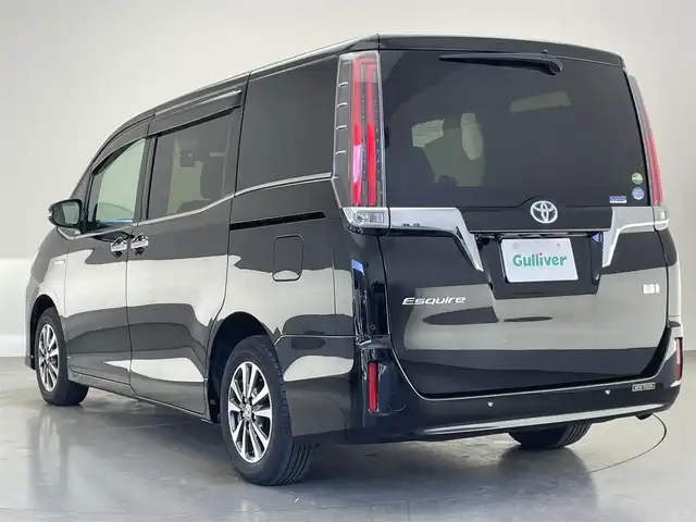 トヨタ エスクァイア ハイブリッド Gi 愛知県 2020(令2)年 2.4万km ブラック 純正９型ナビ　純正後席モニター　禁煙車　バックカメラ　ＥＴＣ　ハーフレザー　シートヒーター　クルコン　　前後ドラレコ　セーフティセンス　衝突軽減　コーナーセンサー　ＬＥＤライト　ＵＳＢ　両側パワスラ