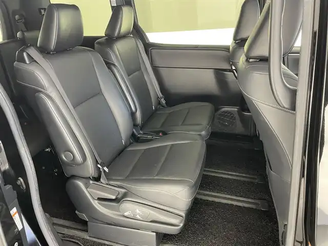 トヨタ エスクァイア ハイブリッド Gi 愛知県 2020(令2)年 2.4万km ブラック 純正９型ナビ　純正後席モニター　禁煙車　バックカメラ　ＥＴＣ　ハーフレザー　シートヒーター　クルコン　　前後ドラレコ　セーフティセンス　衝突軽減　コーナーセンサー　ＬＥＤライト　ＵＳＢ　両側パワスラ