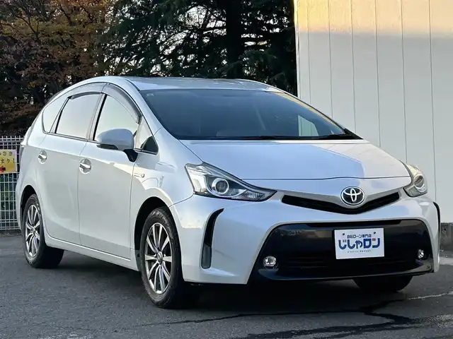 トヨタ プリウス α S 福島県 2015(平27)年 12.8万km ホワイトパールクリスタルシャイン (株)IDOMが運営する【じしゃロン福島店】の自社ローン専用車両になります。こちらは現金またはオートローンご利用時の価格です。自社ローンご希望の方は別途その旨お申付け下さい/純正ナビ/フルセグテレビ/バックカメラ/ETC/ドライブレコーダー/Bluetooth/ドアバイザー/革巻きステアリング/ステアリングリモコン/禁煙車
