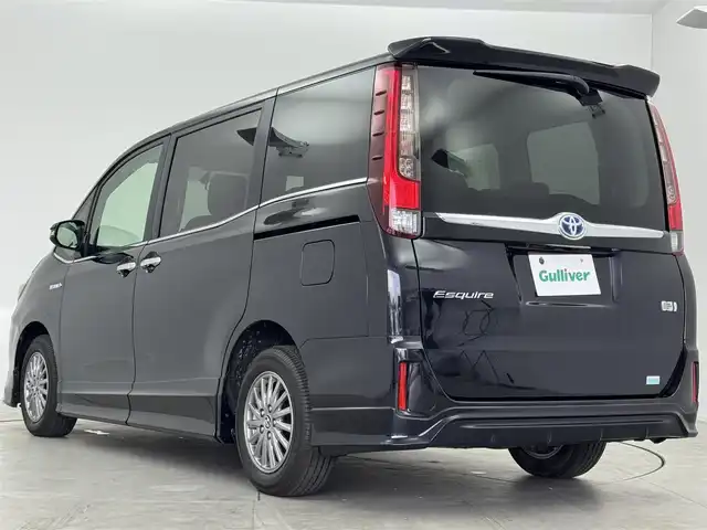 トヨタ エスクァイア ハイブリッド Gi 愛知県 2015(平27)年 7.4万km スパークリングブラックパールクリスタルシャイン TRDフロントエアロ/純正8インチSDナビ　NSZT-Y64/フルセグTV/Bluetooth/CD/DVD　/純正フリップダウンモニター/バックカメラ　/ビルトインETC　/両側パワースライドドア/シートヒーター　（D・N）/クルーズコントロール　/置くだけ充電/ステアリングリモコン　/革巻きステアリング　/黒革調シート　/ウッドコンビハンドル/フォグランプ　