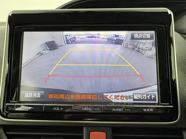 トヨタ エスクァイア ハイブリッド Gi 愛知県 2015(平27)年 7.4万km スパークリングブラックパールクリスタルシャイン TRDフロントエアロ/純正8インチSDナビ　NSZT-Y64/フルセグTV/Bluetooth/CD/DVD　/純正フリップダウンモニター/バックカメラ　/ビルトインETC　/両側パワースライドドア/シートヒーター　（D・N）/クルーズコントロール　/置くだけ充電/ステアリングリモコン　/革巻きステアリング　/黒革調シート　/ウッドコンビハンドル/フォグランプ　