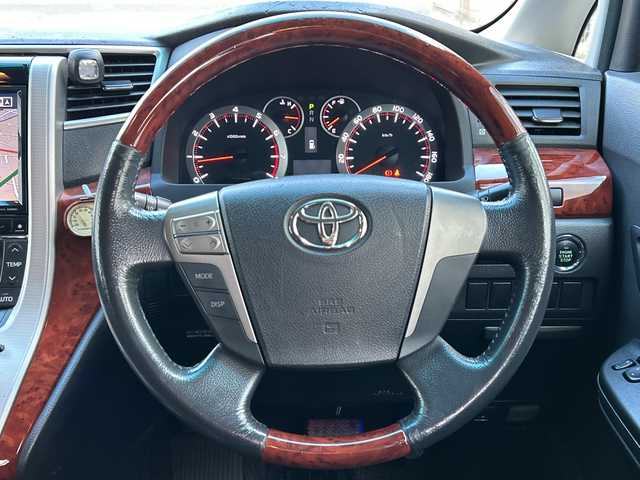 トヨタ ヴェルファイア 2．4Z プラチナセレクション 福岡県 2010(平22)年 14.3万km ブラック 純正ナビ/純正フロアマット/ETC（ビルド）/TV（ワンセグ）/AM/Bluetoothオーディオ/DVD／CD/SD/USB/HDMI/ハンズフリー/オートライト/電動リアゲート/パワースライドドア（左右）/フリップダウンモニター/プッシュスタート/パーキングセンサー/横滑り防止/温度調節付きドリンクホルダー/オットマン/ワンオーナー/フォグランプ