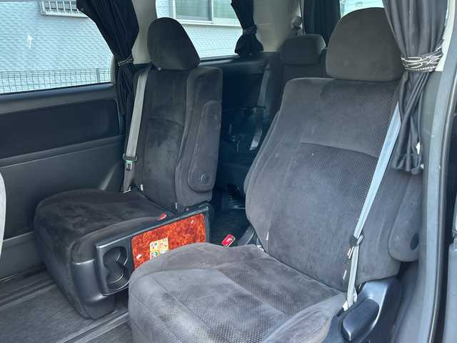 トヨタ ヴェルファイア 2．4Z プラチナセレクション 福岡県 2010(平22)年 14.3万km ブラック 純正ナビ/純正フロアマット/ETC（ビルド）/TV（ワンセグ）/AM/Bluetoothオーディオ/DVD／CD/SD/USB/HDMI/ハンズフリー/オートライト/電動リアゲート/パワースライドドア（左右）/フリップダウンモニター/プッシュスタート/パーキングセンサー/横滑り防止/温度調節付きドリンクホルダー/オットマン/ワンオーナー/フォグランプ