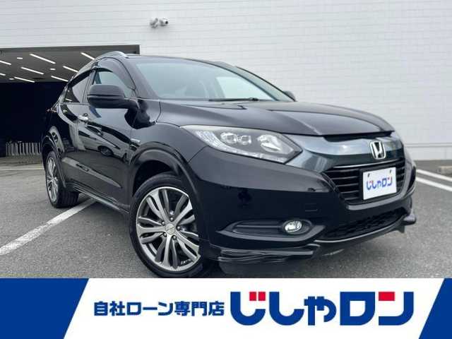 ホンダ ヴェゼル ハイブリッド Z 熊本県 2015(平27)年 10.4万km クリスタルブラックパール (株)IDOMが運営する【じしゃロン熊本店】の自社ローン専用車両になります。こちらは現金またはオートローンご利用時の価格です。自社ローンご希望の方は別途その旨お申付け下さい　/純正ナビ/バックカメラ/フルセグテレビ/DVD/CD/Bluetooth接続/ビルトインETC/ハーフレザーシート/シートヒーター/クルーズコントロール/LEDヘッドライト/スマートキー