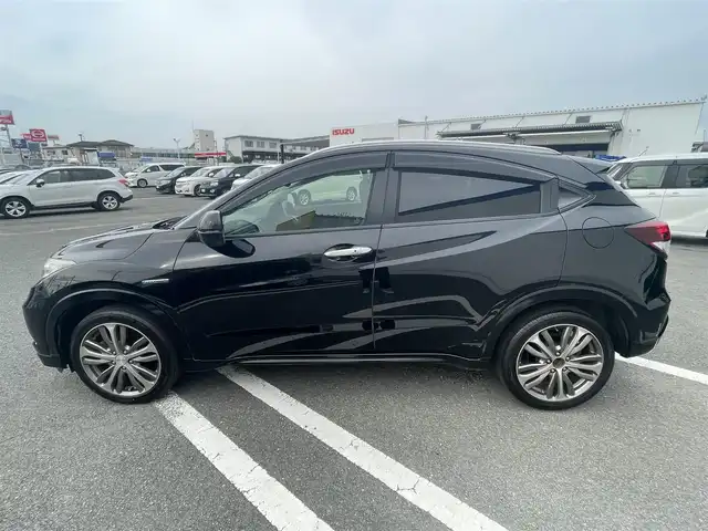ホンダ ヴェゼル ハイブリッド Z 熊本県 2015(平27)年 10.4万km クリスタルブラックパール (株)IDOMが運営する【じしゃロン熊本店】の自社ローン専用車両になります。こちらは現金またはオートローンご利用時の価格です。自社ローンご希望の方は別途その旨お申付け下さい　/純正ナビ/バックカメラ/フルセグテレビ/DVD/CD/Bluetooth接続/ビルトインETC/ハーフレザーシート/シートヒーター/クルーズコントロール/LEDヘッドライト/スマートキー