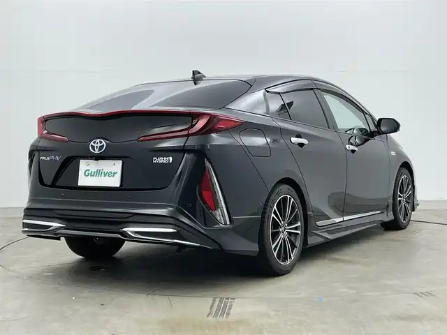 トヨタ プリウス ＰＨＶ A 岡山県 2019(令1)年 6.8万km アティチュードブラックマイカ モデリスタエアロ（F・S・R）/セーフティセンス/ディーラーオプションナビ（NSZT-Y68T）/フルセグTV/Bluetooth/パノラミックビューモニター/革調シートカバー/レーダークルーズ/シートヒーター（運転席・助手席）/パワーシート（運転席）/パーキングサポート/ブラインドスポットモニタリング/LEDオートライト/USB端子・HDMI端子/ビルトインETC/トヨタ純正ホイール
