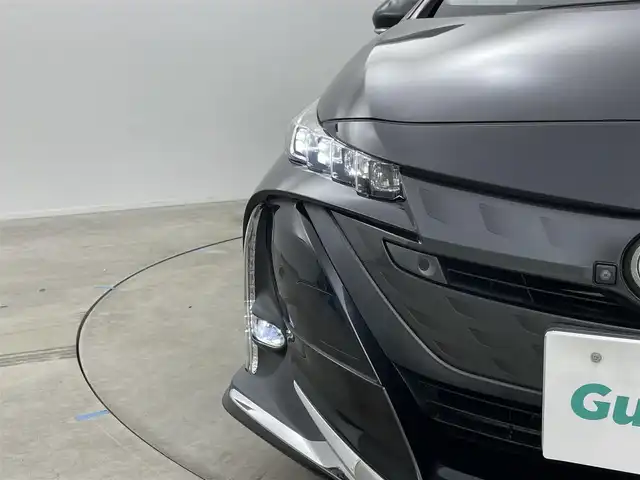 トヨタ プリウス ＰＨＶ A 岡山県 2019(令1)年 6.8万km アティチュードブラックマイカ モデリスタエアロ（F・S・R）/セーフティセンス/ディーラーオプションナビ（NSZT-Y68T）/フルセグTV/Bluetooth/パノラミックビューモニター/革調シートカバー/レーダークルーズ/シートヒーター（運転席・助手席）/パワーシート（運転席）/パーキングサポート/ブラインドスポットモニタリング/LEDオートライト/USB端子・HDMI端子/ビルトインETC/トヨタ純正ホイール