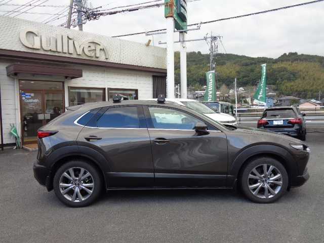 マツダ ＣＸ－３０ 20S Lパッケージ 鹿児島県 2020(令2)年 5万km チタニウムフラッシュマイカ ワンオーナー/マツダコネクトナビ/　Bluetooth DVD再生可能/　フルセグTV/アラウンドビューモニター/ホワイトレザーシート/レーダークルーズコントロール/純正ルーフキャリアー/スマートキー×2/前席パワーシート/前席シートヒーター/ハンドルヒーター/パドルシフト/ブラインドスポットモニター/新車保証書　取説有り