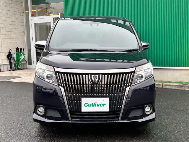 トヨタ エスクァイア Gi ブラックテーラード 宮城県 2016(平28)年 6.7万km スパークリングブラックパールクリスタルシャイン セーフティセンスC/・プリクラッシュセーフティ/・レーンディパーチャーアラート/・オートマチックハイビーム/・先行車発進告知機能/純正フリップダウンモニター（V11T-R62C）/純正ナビ（NSZT-W64）/・CD/DVD/・Bluetooth/・フルセグTV/・SD音楽録音機能/バックカメラ/ビルトインETC/両側パワースライドドア/合皮シート/シートヒーター/ウッドコンビステアリング/クルーズコントロール/ステアリングスイッチ/MTモード付AT/LEDヘッドライト/フォグランプ/オートライト/スマートキー＆プッシュスタート/リアオートエアコン/電動格納ミラー/純正15インチAW/純正フロアマット/W/ニーエアバッグ