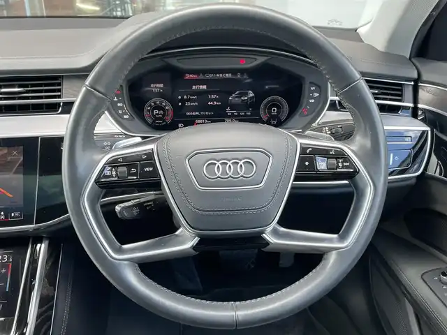 アウディ Ａ８ 55TFSIクワトロ 鹿児島県 2021(令3)年 6.9万km 黒 禁煙車/サンルーフ/純正ナビ/バックカメラ・フロントカメラ・サイドカメラ・全周囲カメラ/パドルシフト/4WD/ETC2.0/パワーバックドア/USB入力端子/パワーシート/純正フロアマット/純正20インチアルミホイール/レザーシート/横滑り防止装置/レーンキープアシスト/オートライト/アダブティブドライブアシスト/アクティブレーンアシスト/アウディレーザーライトパッケージ/ベンチレーション/マトリクスLEDヘッドランプ/バーチャルコックピット/取扱説明書/保証書