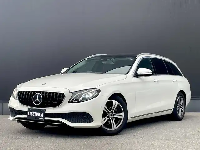 メルセデス・ベンツ Ｅ２２０ｄ ステーションワゴンアバンギャルド 栃木県 2020(令2)年 4.1万km ポーラホワイト パナメリカーナグリル /パノラミックスライディングルーフ /ブルメスターサウンド /ヘッドアップディスプレイ /ワンオーナー  /前後コーナーセンサー  /パワーバックドア/全周囲カメラ /全席シートヒーター  /ドラレコ/保証書/取扱説明書/スペアキー