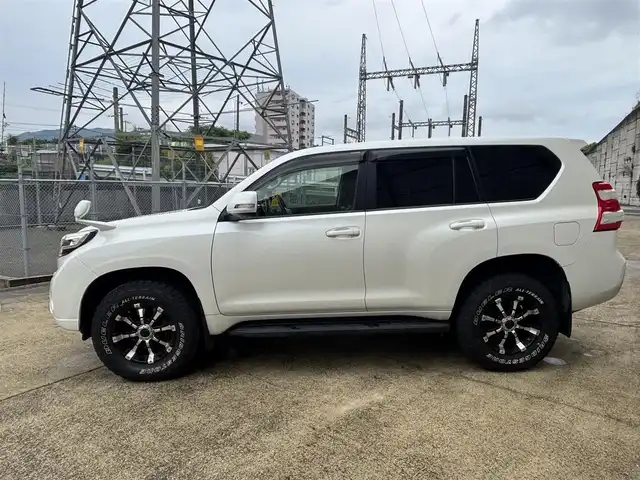 トヨタ ランドクルーザー プラド TX Lパッケージ 長崎県 2014(平26)年 13.1万km ホワイトパールクリスタルシャイン 11型フローティングナビ/(CD/DVD/BT/フルセグ)/バックカメラ/クルーズコントロール/ビルトインETC/黒レザーシート/パワーシート/シートヒーター/スマートキー/プッシュスタート/ドライブレコーダー/社外17インチAW/オートライト/フォグランプ