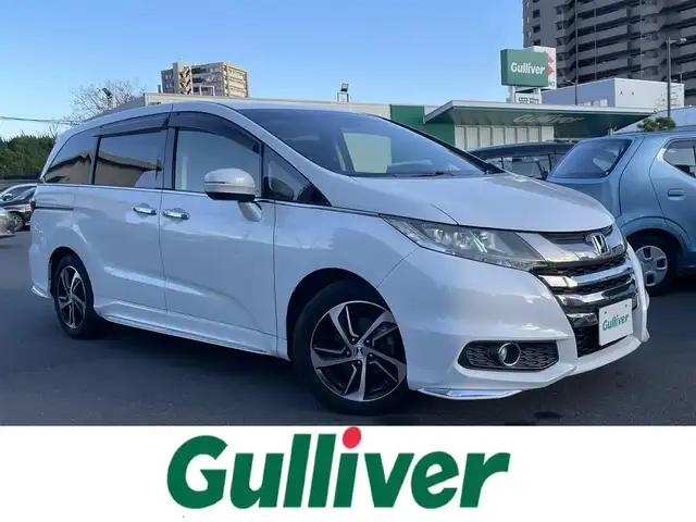 ホンダ オデッセイ アブソルート 島根県 2015(平27)年 7.2万km ホワイトオーキッドパール 純正ＳＤナビ・フルセグTV/ＤＶＤ再生・Ｂｌｕｅｔｏｏｔｈ　/純正フリップダウンモニター　/バックカメラ/ビルトインＥＴＣ　/両側パワースライドドア　/アダプティブクルーズコントロール　/衝突軽減ブレーキ　/レーンアシスト　/純正LEDヘッドライト/純正アルミホイール/純正フロアマット