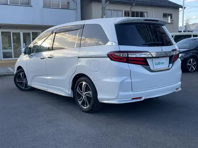 ホンダ オデッセイ アブソルート 島根県 2015(平27)年 7.2万km ホワイトオーキッドパール 純正ＳＤナビ・フルセグTV/ＤＶＤ再生・Ｂｌｕｅｔｏｏｔｈ　/純正フリップダウンモニター　/バックカメラ/ビルトインＥＴＣ　/両側パワースライドドア　/アダプティブクルーズコントロール　/衝突軽減ブレーキ　/レーンアシスト　/純正LEDヘッドライト/純正アルミホイール/純正フロアマット