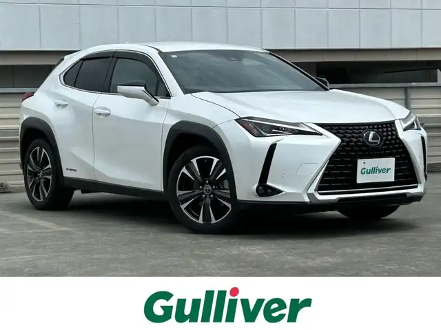 レクサス ＵＸ 250h バージョンC 静岡県 2019(平31)年 2.2万km ソニッククォーツ 純正メーカーナビ/・フルセグ/CD/Bluetooth/USB/バックカメラ/ビルトインETC2.0/クルーズコントロール追従有/パワーバックドア/ハーフレザーシート/革巻きステアリング/・ステアリングスイッチ/パワーシートD/N/シートヒーターD/N/電動パーキングブレーキ/ステアリングヒーター/オートライト/スマートキー/・プッシュスタート/LEDヘッドライト/・フォグランプ/電動格納ミラー/ウインカーミラー/純正アルミホイール/純正フロアマット/純正ドアバイザー