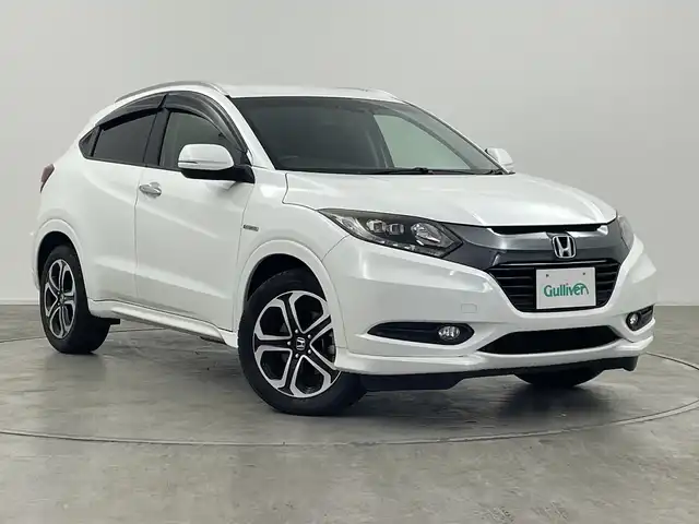 ホンダ ヴェゼル ハイブリッド Z 群馬県 2015(平27)年 8.5万km ホワイトオーキッドパール 純正ナビ　フルセグＴＶ　バックカメラ　シートヒーター　ハーフレザーシート　パドルシフト　電動パーキングブレーキ　クルーズコントロール　衝突被害軽減ブレーキ　ＬＥＤライト　スマートキー　禁煙車