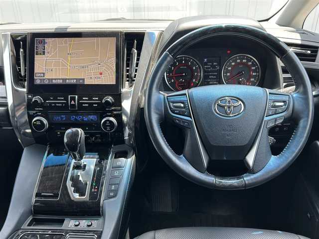 トヨタ アルファード S Cパッケージ 愛媛県 2020(令2)年 2.6万km ブラック フリップダウンモニター/JBLサウンド/パーキングアシスト/ステアリングヒーター/純正ナビ/Bluetooth/CD/DVD/Blu-ray/追従クルコン/100V充電/オットマン/電動リアゲート/前後ドラレコ/パワーシート/シートヒーター/エアシート/両側パワースライドドア/前後コーナーセンサー/デジタルインナーミラー/BSM