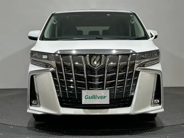 トヨタ アルファード S Cパッケージ 愛媛県 2022(令4)年 2.1万km ホワイトパールクリスタルシャイン ・９型ナビ（フルセグＴＶ・ＢＴ・ＤＶＤ・ＵＳＢ）/・バックカメラ　/・１２．１型後席モニター　/・サンルーフ　/・衝突軽減ブレーキ　/・ＤＮ席シートヒーター　/・ＤＮ席パワーシート　/・ＤＮ席ベンチレーション　/・両側電動ドア/・ステアリングヒーター/・ETC2.0/・オートマチックハイビーム/・デジタルインナーミラー