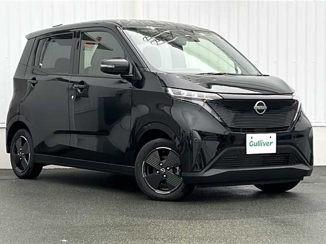 日産 サクラ X 三重県 2023(令5)年 1.7万km ブラック 純正ナビ /バックカメラ /ワイヤレス充電器 /スペアキー /前後ドライブレコーダー /前後コーナーセンサー /レザー調シートカバー /LEDヘッドライト /オートライト /オートホールド /ステアリングスイッチ/純正フロアマット /電動格納ミラー/禁煙車