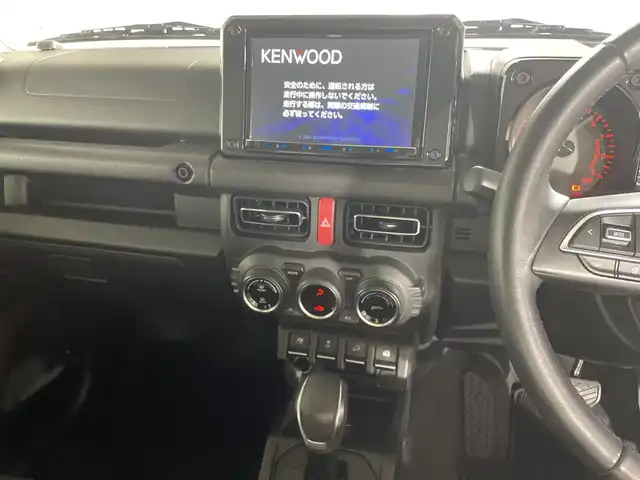 スズキ ジムニー XC 福岡県 2021(令3)年 3.8万km ブルーイッシュブラックパール3 ・社外SDナビ　/（ＡＭ　ＦＭ　ＣＤ　ＤＶＤ　ＳＤ　Ｉｐｏｄ　ＵＳＢ　ＢＴ）　/・バックカメラ　/・ＥＴＣ　/・前後ドラレコ　/・クルコン　/・ワンセグＴＶ　/・背面タイヤ　/・横滑り防止　/・レーンキープ　/・ダウンヒルアシスト　/・衝突軽減/・ヘッドライトウォッシャー/・オートライト/・純正フロアマット/・純正16インチアルミ/・電格ミラー/・バイザー/・取説