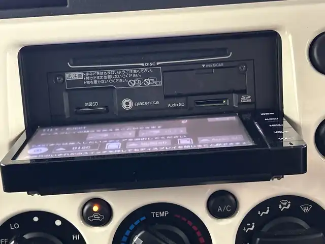 トヨタ ＦＪクルーザー 三重県 2014(平26)年 5.3万km ホワイト /純正ナビ//フルセグ/CD/Bluetooth//バックカメラ//ETC//ステアリングスイッチ//ＯＰサイドステップ//コーナーセンサー//リモコンキー//ライトレベライザー//フロアマット