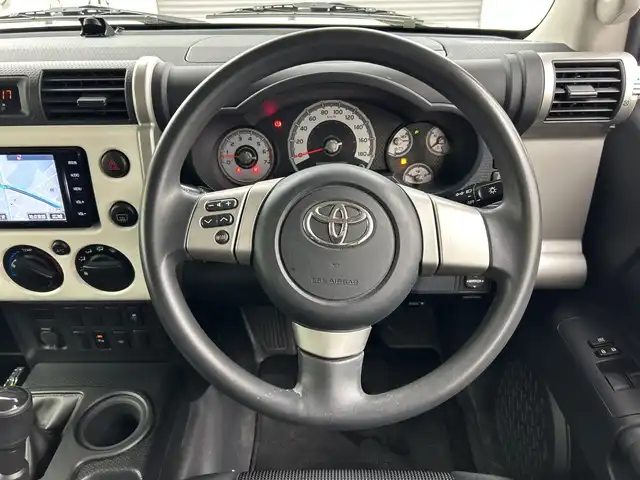 トヨタ ＦＪクルーザー 三重県 2014(平26)年 5.3万km ホワイト /純正ナビ//フルセグ/CD/Bluetooth//バックカメラ//ETC//ステアリングスイッチ//ＯＰサイドステップ//コーナーセンサー//リモコンキー//ライトレベライザー//フロアマット