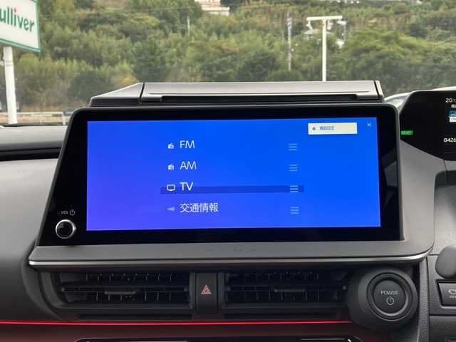 トヨタ プリウス Z 佐賀県 2025(令7)年 0.9万km グレー ワンオーナー/純正12.3インチディスプレイオーディオ/パノラマミックビューモニター/プリクラッシュセーフティ/レーンディパーチャーアラート/オートハイビーム/アダプティブクルーズコントロール/クリアランスソナー/ブラインドスポットモニター/リアクロストラフィックアラート/電動パーキングブレーキ/オートブレーキホールド/パーキングアシスト/デジタルインナーミラー/置くだけ充電/レザーシート/パワーシート/シートヒーター/エアシート/ステアリングヒーター/ステアリングリモコン/パワートランク/ETC2.0/プッシュスタート/スマートキー/LEDヘッドライト/社外アルミホイール/アッシュグレー（1M2)