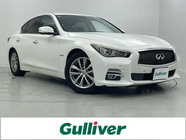 日産 スカイライン ハイブリッド 350GT Type P 茨城県 2014(平26)年 5.2万km クリスタルホワイトパール 純正ナビ/全方位カメラ/フルセグ/衝突被害軽減ブレーキ/車線逸脱抑制装置/レーダークルーズコントロール/オートマチックハイビーム/ソナー/BSI/ETC/黒革シート/シートヒーター/純正17インチAW/LEDヘッドライト/スマートキー