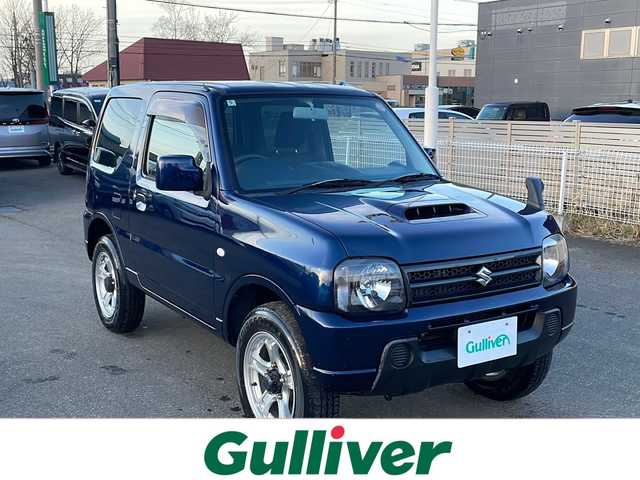 スズキ ジムニー XG 道東・釧路十勝 2016(平28)年 9.3万km ノクターンブルーパール 4WD/社外オーディオ/AM/FM　/ＣＤ再生/横滑り防止装置　/リモコンキー　/純正１６インチアルミホイール　/社外フロアマット