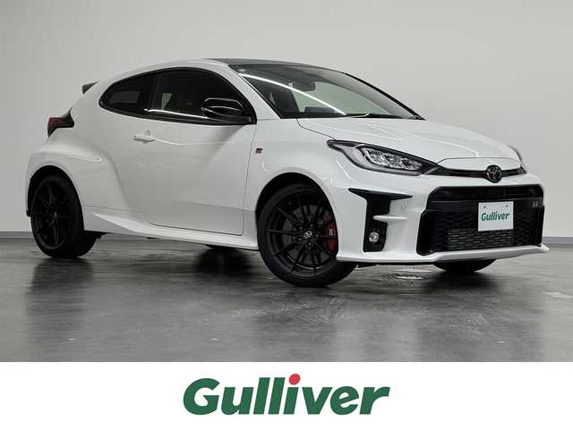 トヨタ ＧＲヤリス RZ ハイパフォーマンス 三重県 2020(令2)年 3万km スーパーホワイトⅡ プレミアムガソリン・ターボ/4WD/6F（iMT：オートブリッピング機能付）/純正 8インチディスプレイオーディオ＋ナビ/（AM/FM/USB/iPod/Bluetooth/Miracast/CarPlay/AndroidAuto）/バックガイドモニター/JBLプレミアムサウンドシステム/ビルトイン ETC2.0/【OP】予防安全パッケージ*1/●【OP】Toyota Safety Sense/-プリクラッシュセーフティ/●レーントレーシングアシスト/●レーダークルコン/●オートハイビーム/●ロードサインアシスト/・パーキングサポートブレーキ（前後静止物・後方接近車両）/・先行車発進告知機能/・セカンダリーコリジョンブレーキ/・ブラインドスポットモニター/・トラクションコントロール/装備/・【OP】カラーヘッドアップディスプレイ*1/・【OP】オートワイパー（雨滴感知式）*1/・【OP】シートヒーター*2/・【OP】ステアリングヒーター*2/・左右独立オートエアコン/・ステアリングスイッチ/・3灯式LEDヘッドランプ＆LEDフロントフォグライト/・オートワイパー（雨滴感知式）*1/・冷却スプレー機能付空冷インタークーラー/・スマートキーx2/・保/取/ナビ取/*1.*2はそれぞれセットでメーカーOP