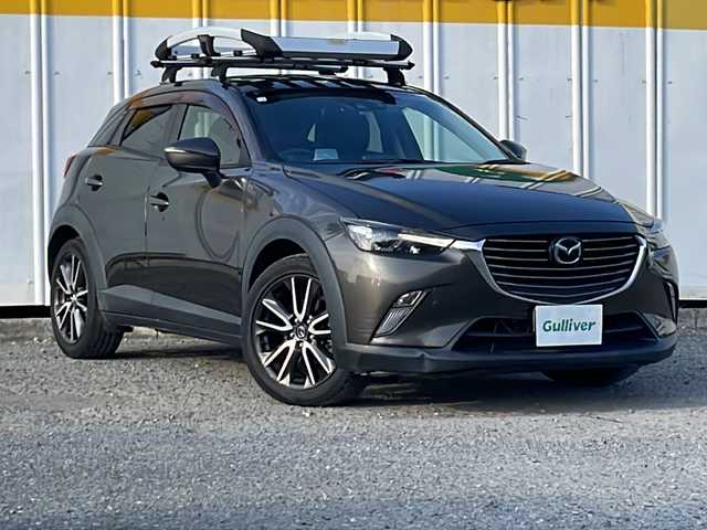 マツダ ＣＸ－３ XD ツーリング 新潟県 2015(平27)年 4.3万km チタニウムフラッシュマイカ 外部検査実施済み/４WD/ターボ/ワンオーナー/純正SDナビ/(CD/DVD/フルセグTV/Bluetooth/USB)/セーフティクルーズパッケージ/・車線逸脱警報システム/・レーダークルーズコントロール/・スマートブレーキサポート/・ハイビームコントロールシステム/ハーフレザーシート/バックカメラ/LEDヘッドライト/スマートキー/ビルトインETC/前後ドライブレコーダー/前席シートヒーター/ブラインドスポットモニター/ヘッドアップディスプレイ/ルーフキャリア/パドルシフト/横滑り防止機能/純正18インチアルミホイール/カーテンエアバック/保証書/スペアキー