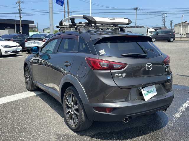 マツダ ＣＸ－３ XD ツーリング 新潟県 2015(平27)年 4.3万km チタニウムフラッシュマイカ ４WD/純正SDナビ/(BT/CD/DVD/フルセグTV)/セーフティクルーズパッケージ/ハーフレザーシート/バックカメラ/LEDヘッドライト/スマートキー/ビルトインETC/前後ドライブレコーダー/前席シートヒーター/ブラインドスポットモニター/ヘッドアップディスプレイ/ルーフキャリア/パドルシフト/横滑り防止機能/純正18インチアルミホイール/カーテンエアバック/保証書/スペアキー