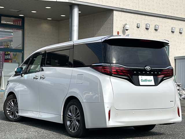 トヨタ アルファードハイブリット Z 愛知県 2023(令5)年 1.8万km プラチナホワイトパールマイカ 登録時走行距離17947キロ/ワンオーナー/純正ナビゲーション/(BT/フルセグTV/)/バックカメラ/全方位モニター/前後ドライブレコーダー/トヨタセーフティー/プリクラッシュセーフティー/レーンディパーチャーアラート/先行車発進告知/ロードサインアシスト/レーダークルーズコントロール/純正デジタルインナーミラー/リヤカメラディテクション/プロアクティブドライビングアシスト/リヤクロストラフィックアラート/ブラインドスポットモニター/パーキングサポートブレーキ/カラーヘッドアップディスプレイ/後席パワーサイドサンシェード/純正ビルドイン2.0ETC/左右独立ムーンルーフ/オットマン/両側パワースライドドア/パワーシート/パワーバックドア/シートヒーター/エアシート/ステアリングヒーター/純正ドアバイザー/純正フロアマット/プッシュスタート/ウィンカーミラー/スペアキー×１/取扱説明書/保証書/整備記録簿