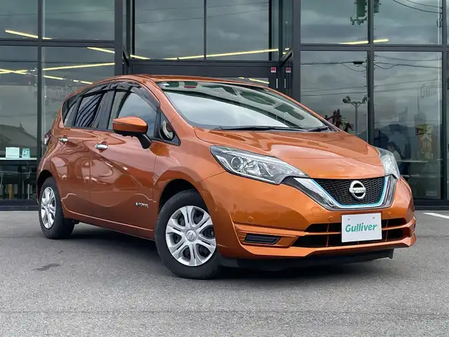 日産 ノート e－パワー X 愛媛県 2016(平28)年 3.9万km プレミアムコロナオレンジ 純正7型ナビ(フルセグTV/BT)/全周囲カメラ/インテリジェントルームミラー/ドライブレコーダー/クリアランスソナー/衝突被害軽減装置/車線逸脱防止装置/ステアリングリモコン/純正ドアバイザー/純正フロアマット/LEDヘッドライト/シガーソケット/スペアキー1本/現状サマー(鉄)(185/70/R14)/BRIDGESTONE EcoPia/禁煙車